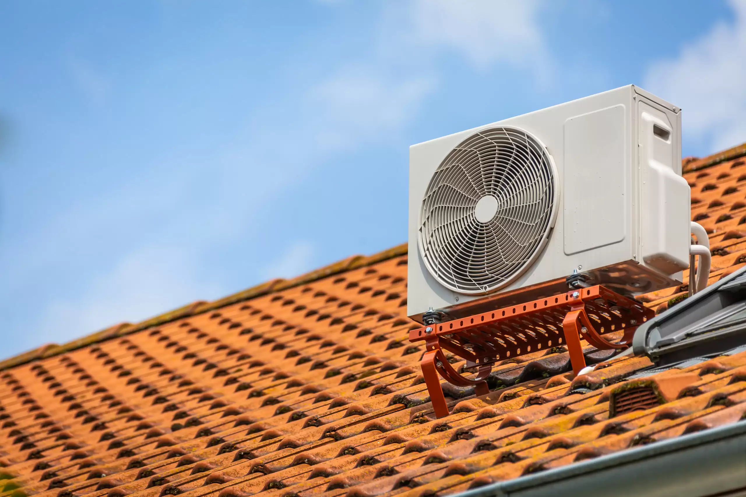 Dual inverter, combination of air conditioner compressor and heating pump, installed on a roof of family house